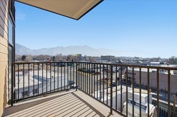 Balcony with a view of parking lot and mountains1